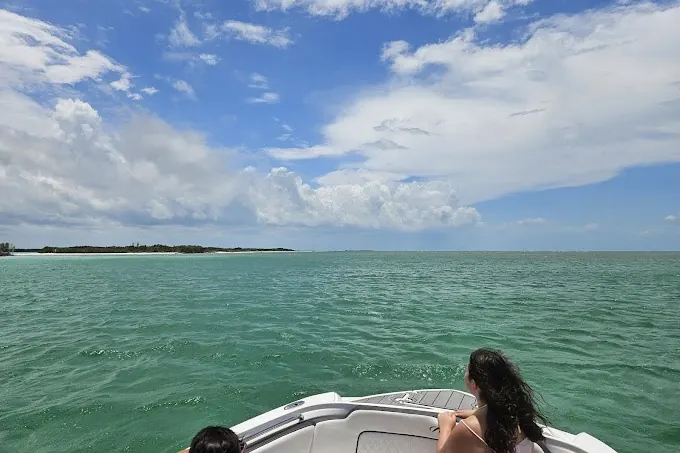 Private boat anchored off a quiet beach near St. Pete Beach