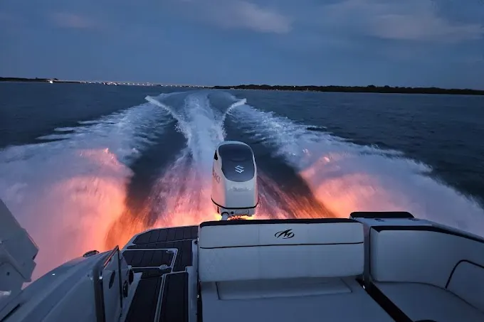 Uncrowded private boat cruising calm bay water