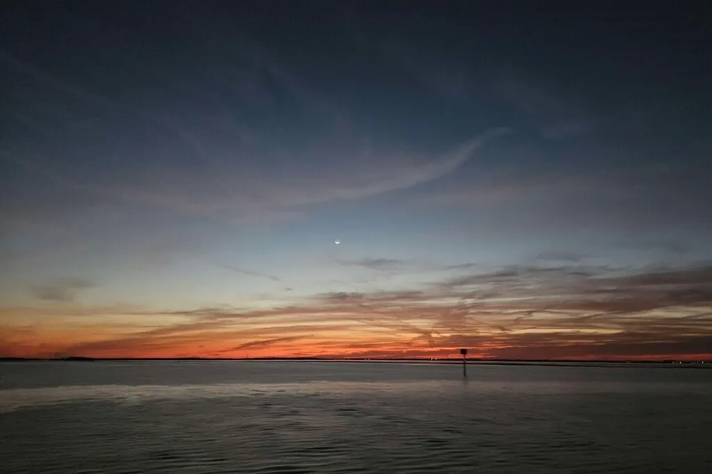Sun setting over Boca Ciega Bay from a private boat