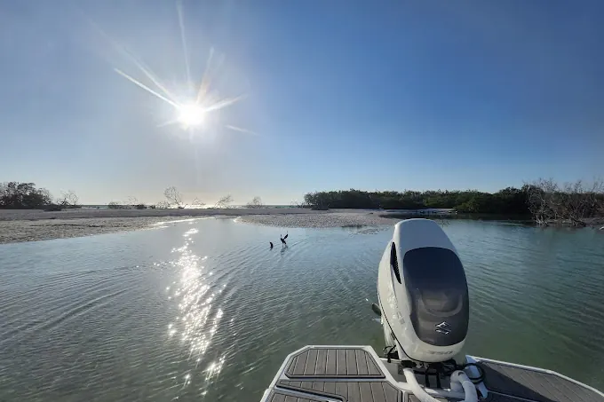 Private boat anchored at a quiet beach near Madeira Beach