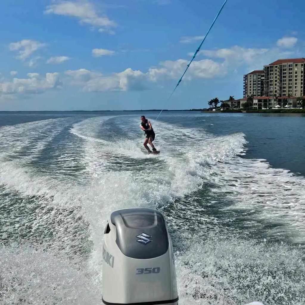 A person enjoying Snorkeling Allen's Aquatic Adventures in vibrant Gulf waters.