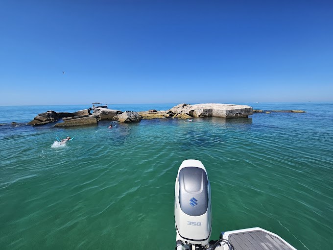 Multi stop boat tour adventure in Tampa Bay with scenic destinations and boating fun