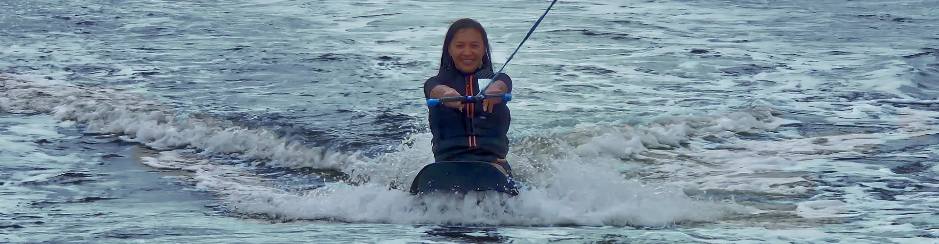 A person enjoying Snorkeling Allen's Aquatic Adventures in vibrant Gulf waters.